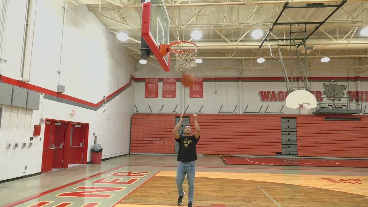 Group of JCPS coaches providing basketball players opportunities to learn life skills
